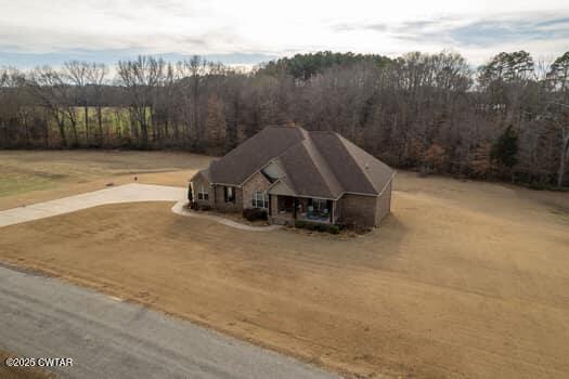 325 Ridgewood Drive Henderson, TN 38340 - Photo 62 of 63 a car parked on the side of a road