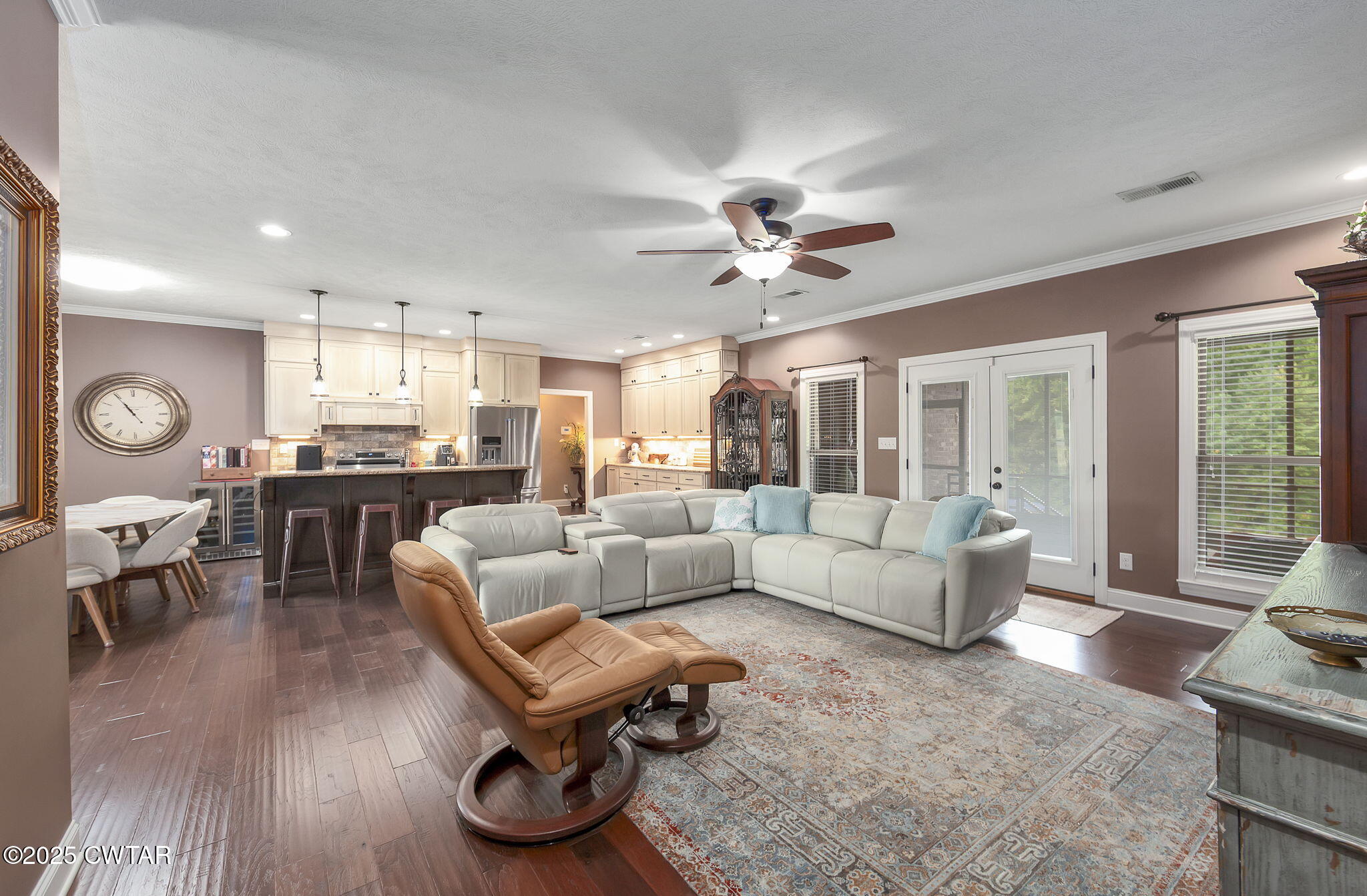 325 Ridgewood Drive Henderson, TN 38340 - Photo 7 of 63 a living room with furniture kitchen view and a large window