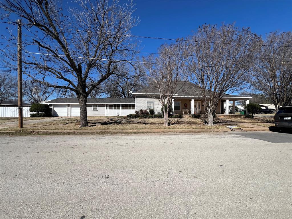316 East Spring Street Henrietta, TX 76365 - Photo 2 of 28 a house view with a outdoor space