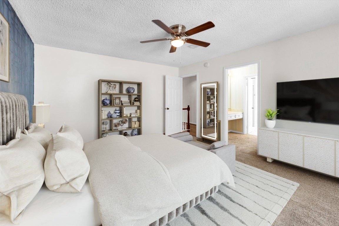 19535 Enchanted Oaks Drive Spring, TX 77388 - Photo 4 of 42 Primary bedroom is spacious and located on second floor. *virtually staged*