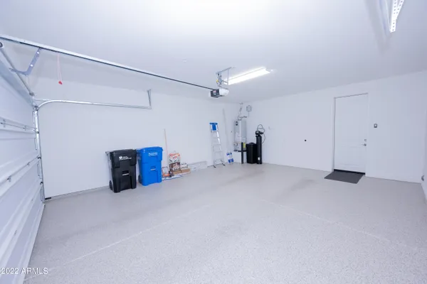 a view of a big room with closet and windows