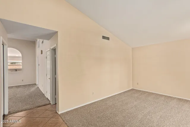 a view of a room with large windows