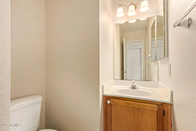 a utility room with sink dryer and washer