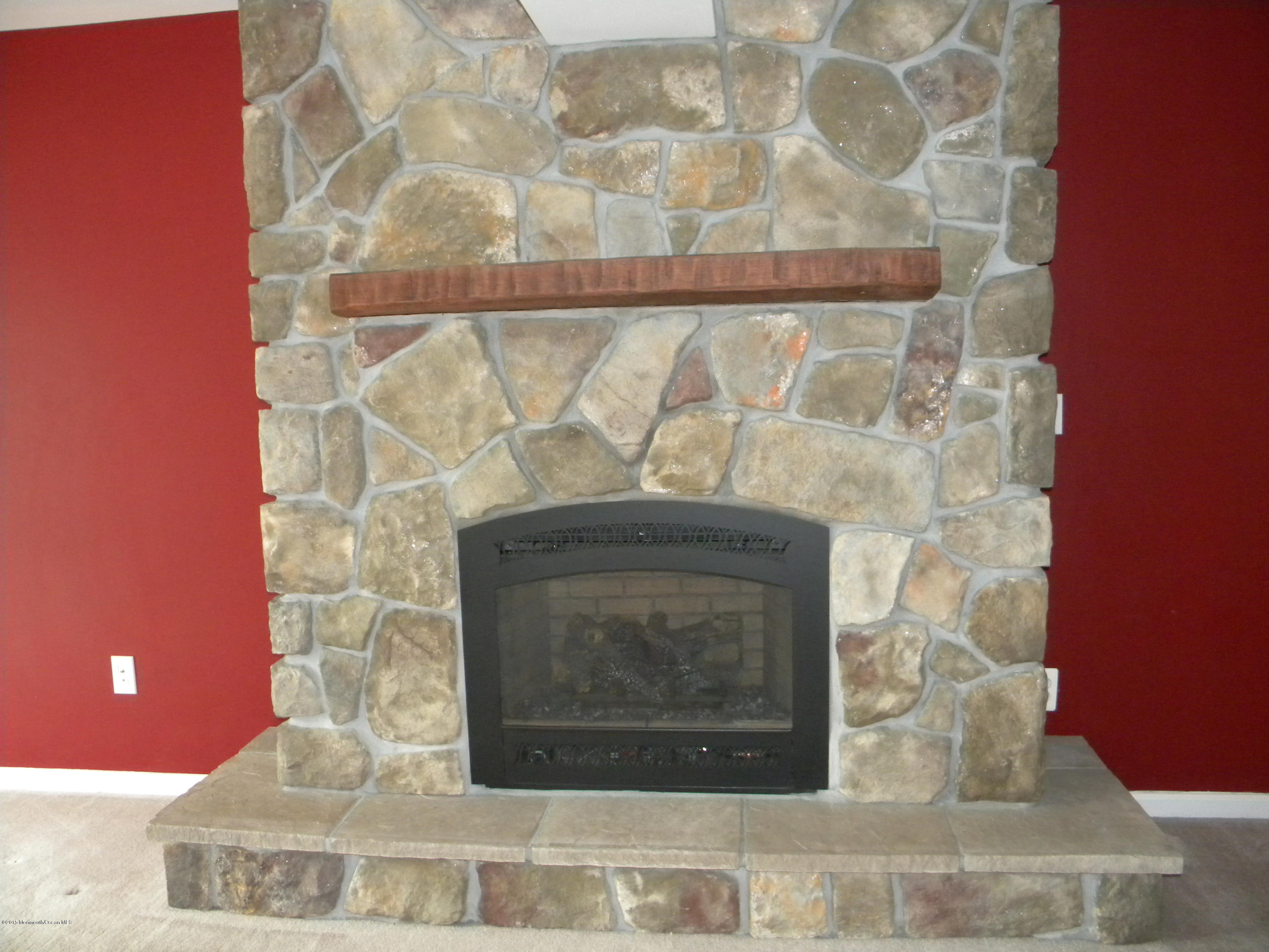 109 Gaff Road Manahawkin, NJ 08050 - Photo 6 of 25 Living room fireplace