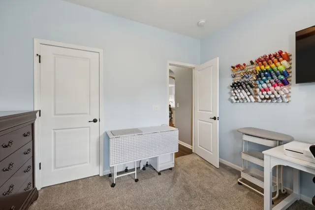 a view of a workspace with furniture