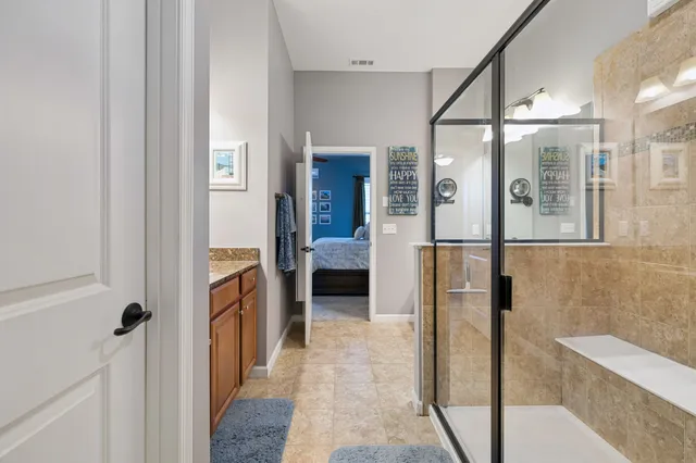 a view of a bathroom from the hallway