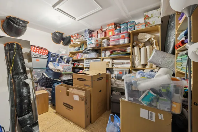 a view of a chairs and table in the balcony