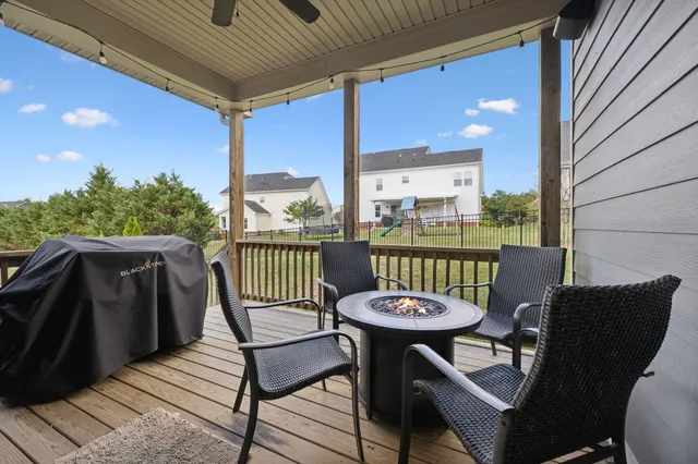 a balcony view with a seating space