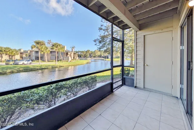 a view of swimming pool with outdoor space and seating area