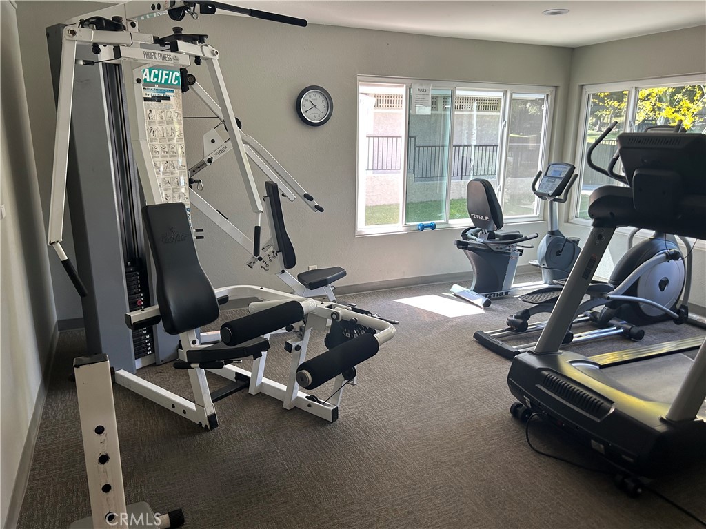 26226 Rainbow Glen Drive Newhall, CA 91321 - Photo 27 of 27 a view of a room with gym equipment