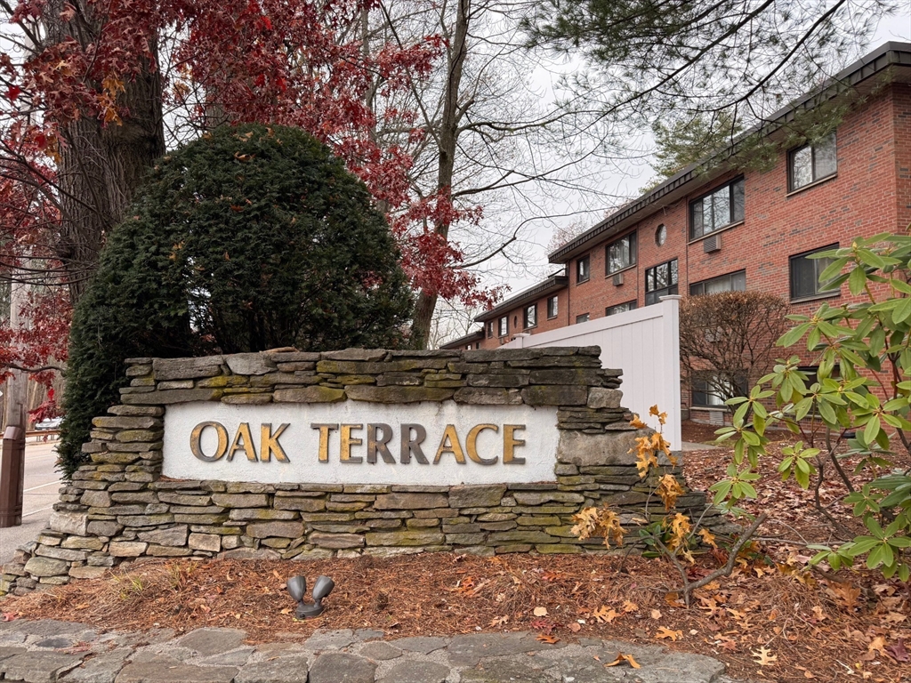 1325 Worcester Road, Unit D8 Framingham, MA 01701 - Photo 1 of 20 a sign on a pole on a street