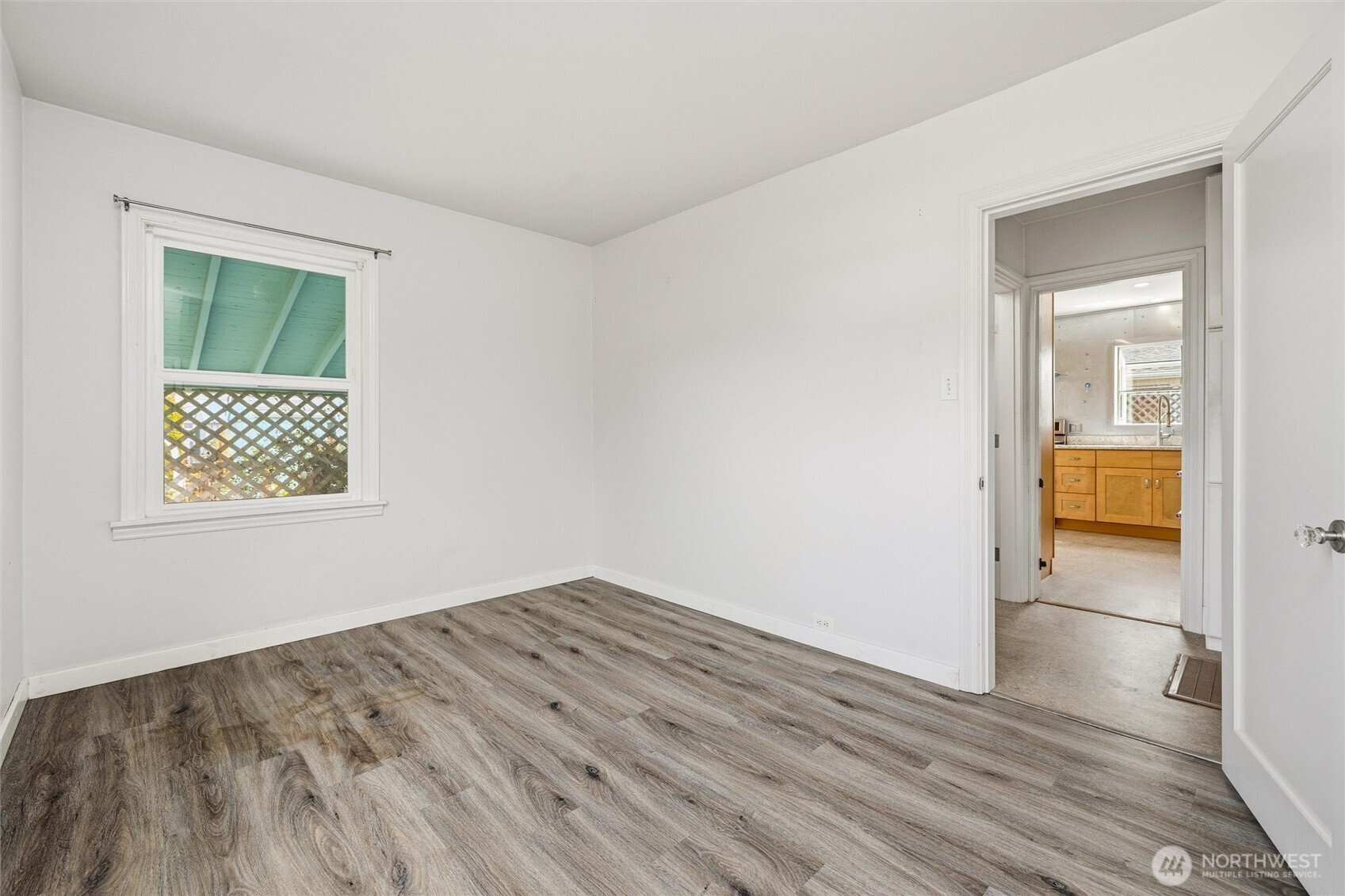 2836 Patton Street Bellingham, WA 98225 - Photo 18 of 40 an empty room with wooden floor and a window
