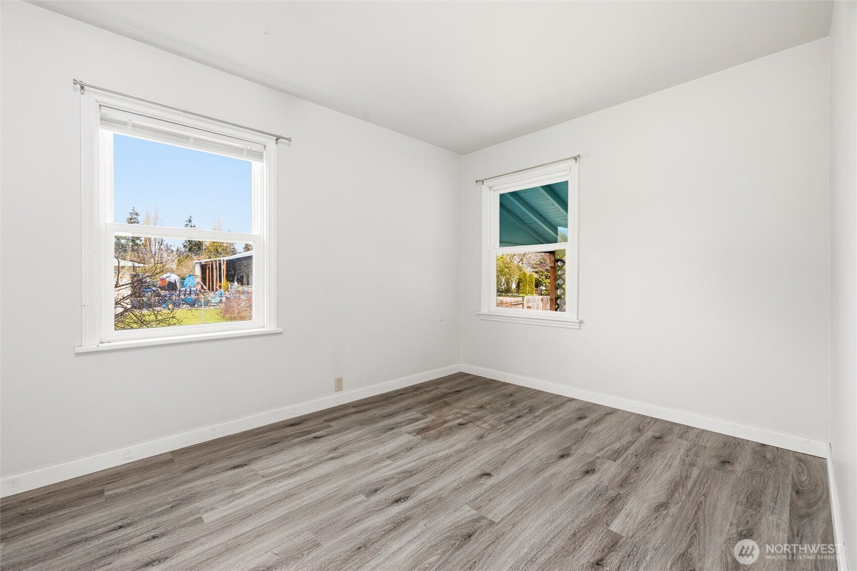 2836 Patton Street Bellingham, WA 98225 - Photo 19 of 40 an empty room with a window and wooden floor