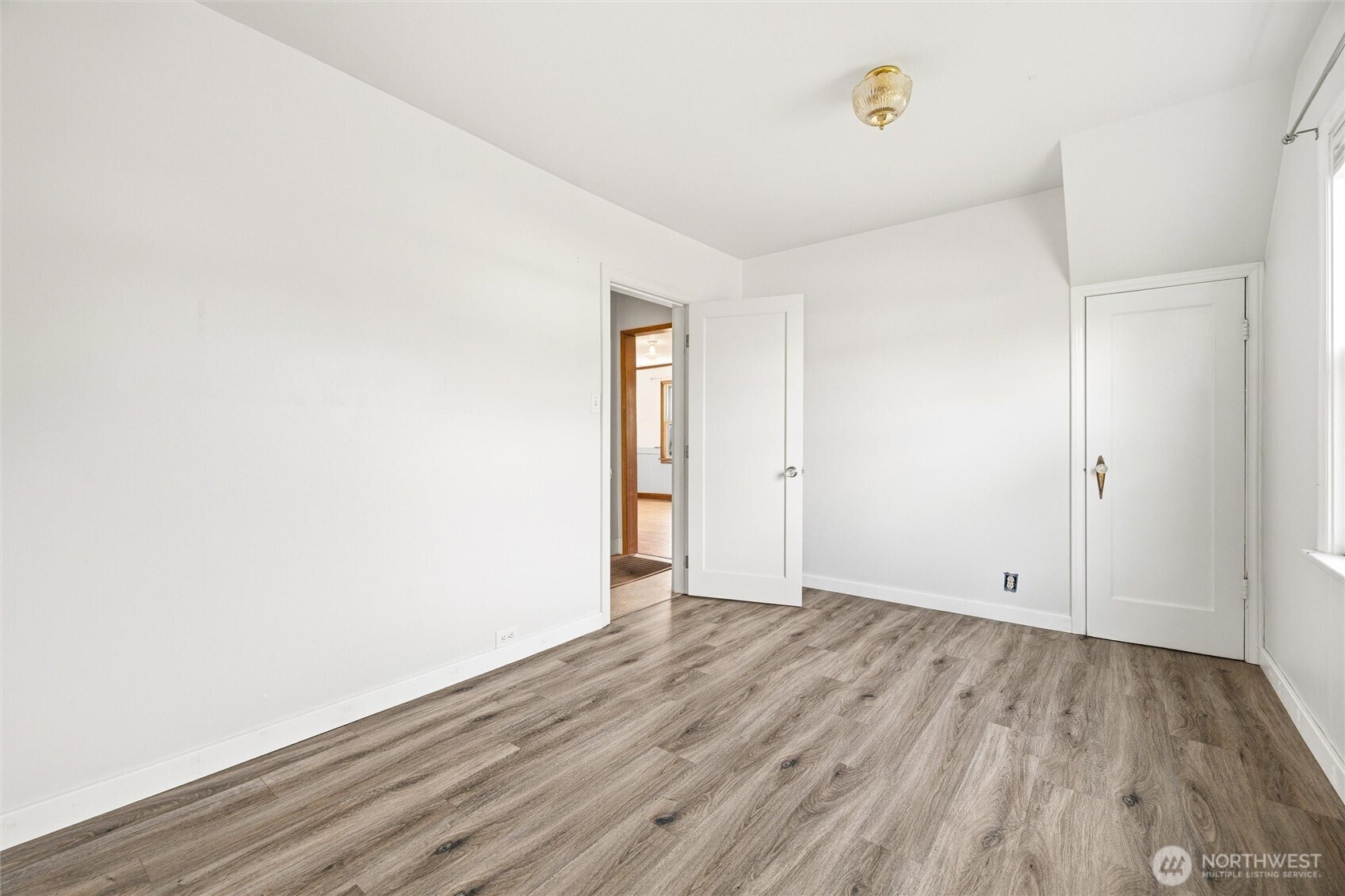 2836 Patton Street Bellingham, WA 98225 - Photo 20 of 40 a view of an empty room with wooden floor