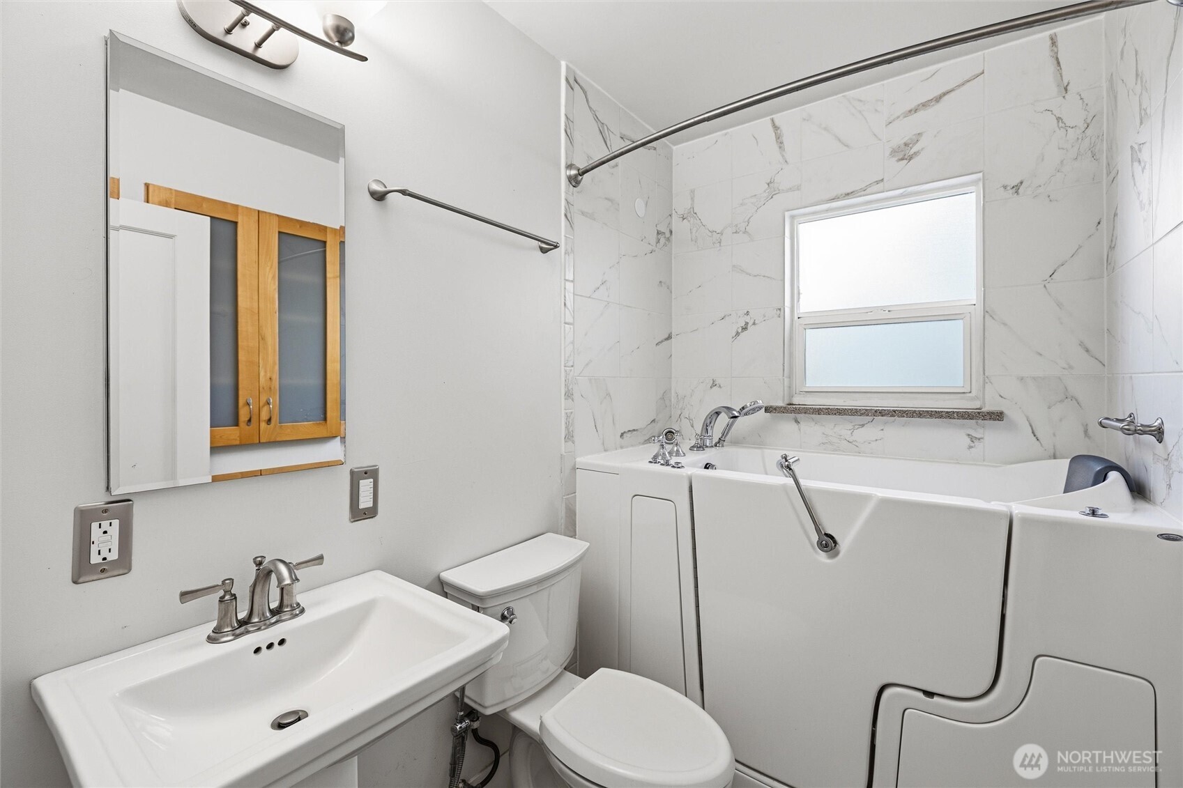 2836 Patton Street Bellingham, WA 98225 - Photo 21 of 40 a bathroom with a sink mirror toilet and shower