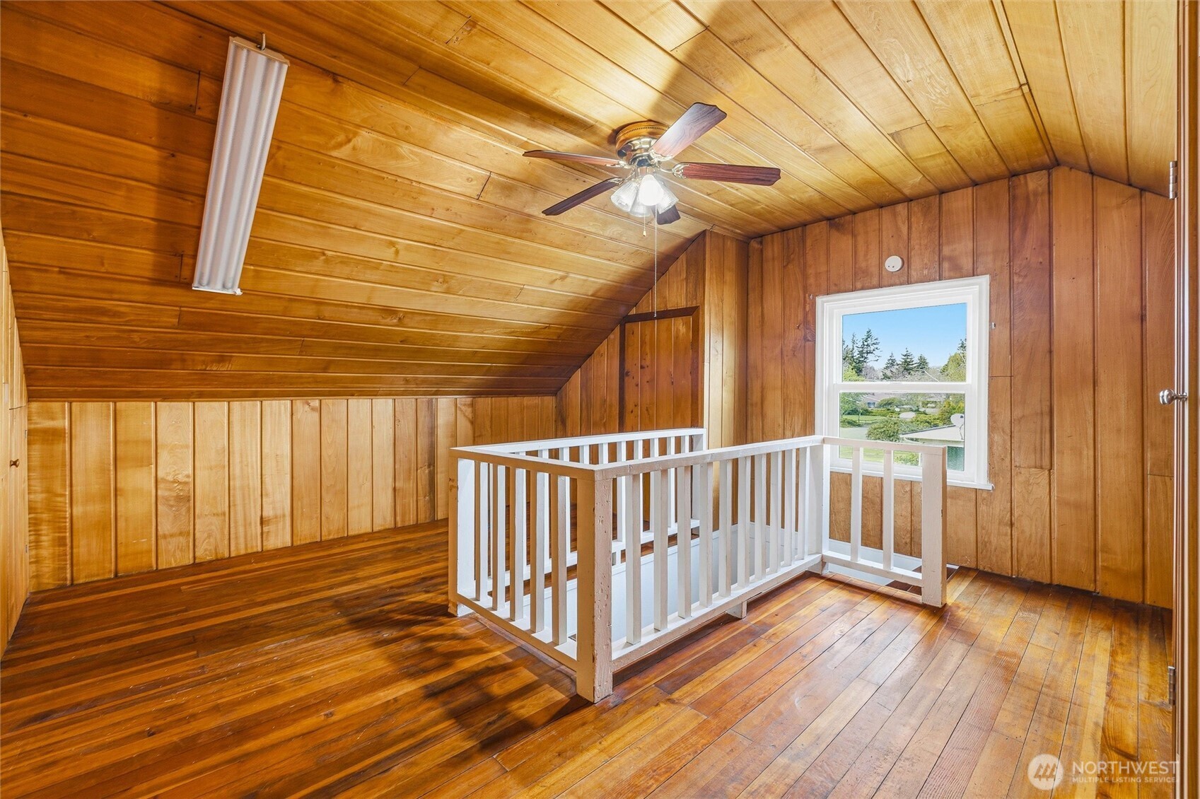 2836 Patton Street Bellingham, WA 98225 - Photo 26 of 40 a view of a room with wooden floor and windows