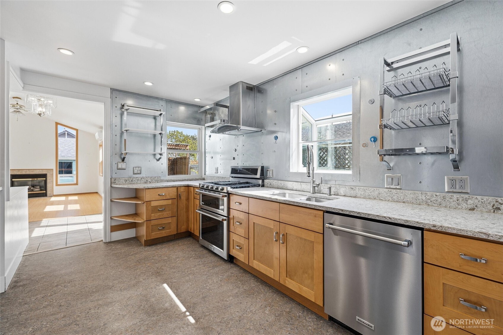 2836 Patton Street Bellingham, WA 98225 - Photo 10 of 40 a large kitchen with stainless steel appliances granite countertop a sink and cabinets