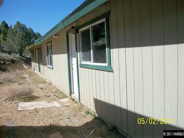 2830 Bullfrog Road Reno, NV 89521 - Photo 11 of 13 a view of a house with a backyard