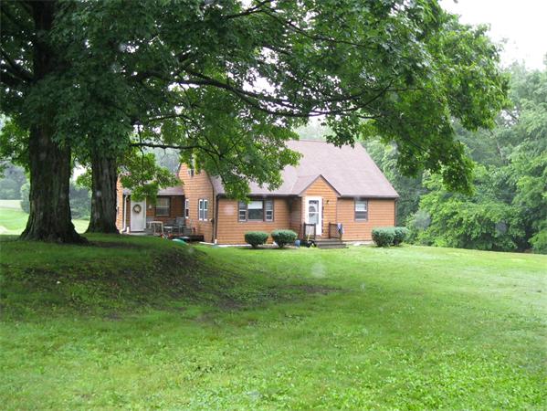 329 River Road Andover, MA 01810 - Photo 1 of 21 a front view of a house with yard and tree