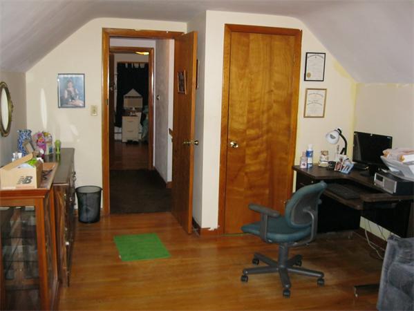 329 River Road Andover, MA 01810 - Photo 14 of 21 a workspace with furniture and a gate