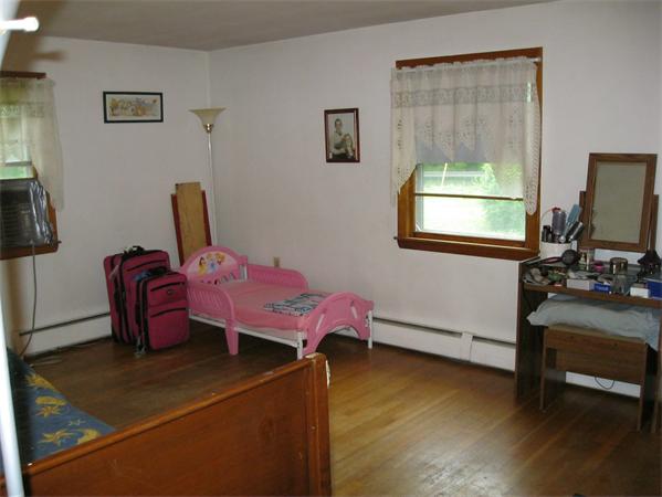 329 River Road Andover, MA 01810 - Photo 18 of 21 a living room with furniture and a window