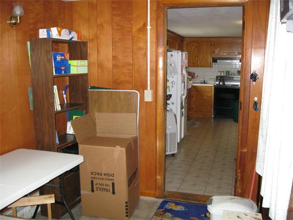 329 River Road Andover, MA 01810 - Photo 4 of 21 a room with a table and chairs