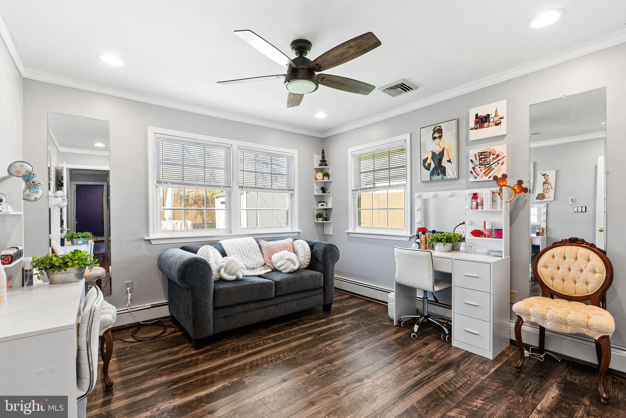 48 Silverbell Road Levittown, PA 19056 - Photo 18 of 35 a living room with furniture and a window
