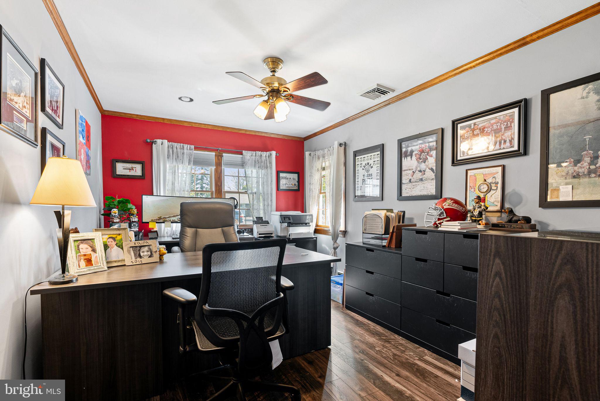 48 Silverbell Road Levittown, PA 19056 - Photo 21 of 35 a dining room with wooden floor and a chandelier