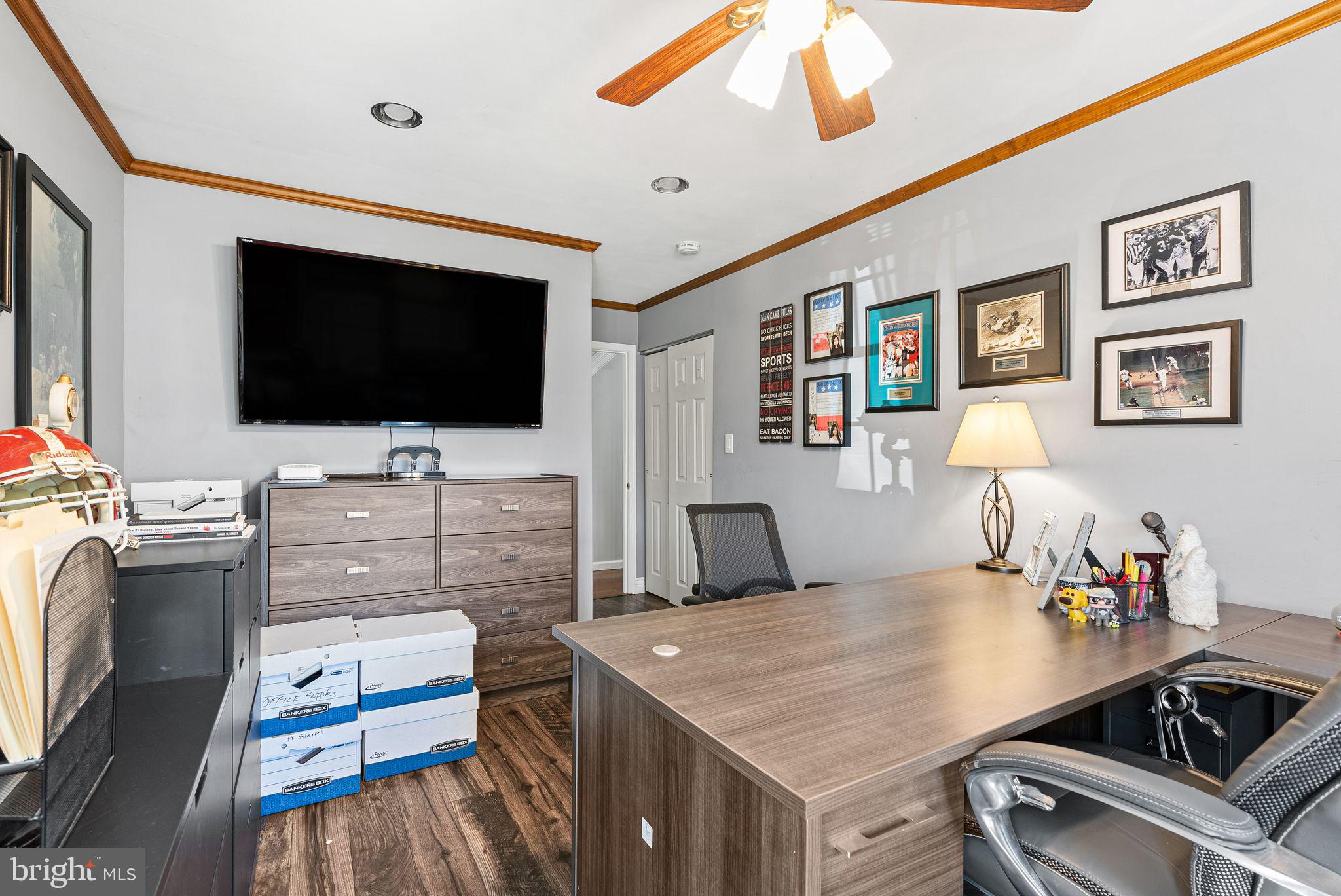 48 Silverbell Road Levittown, PA 19056 - Photo 22 of 35 a living room with furniture and a flat screen tv
