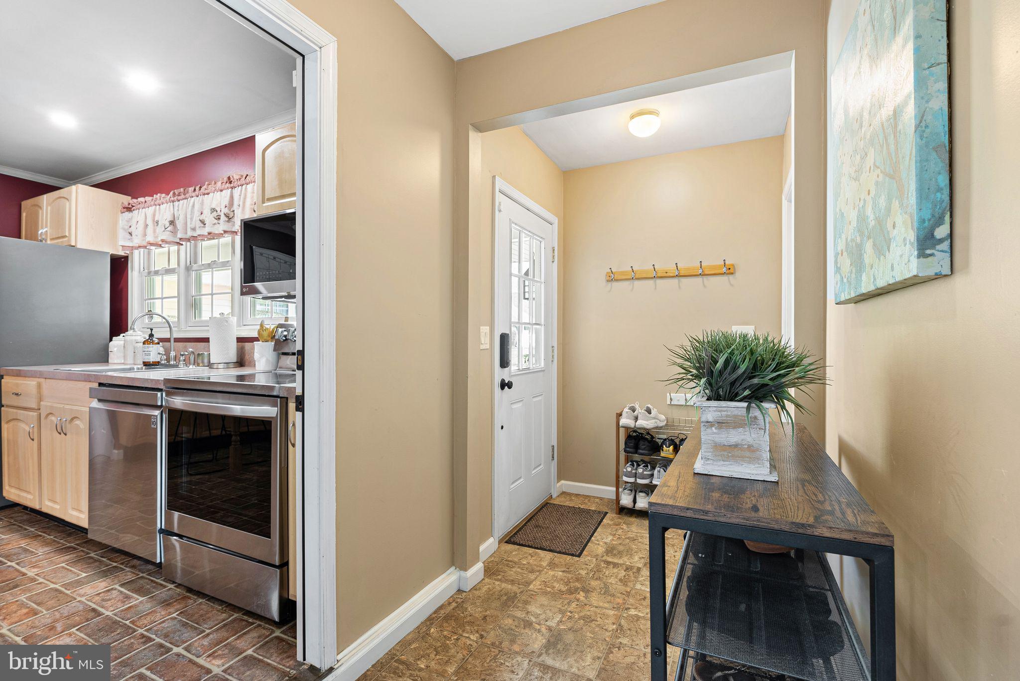 48 Silverbell Road Levittown, PA 19056 - Photo 27 of 35 a view of a kitchen with a sink and dishwasher kitchen view