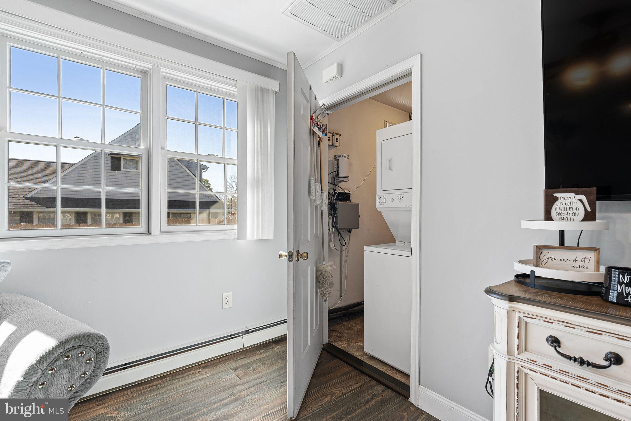 48 Silverbell Road Levittown, PA 19056 - Photo 30 of 35 a room with a stove and wooden floor