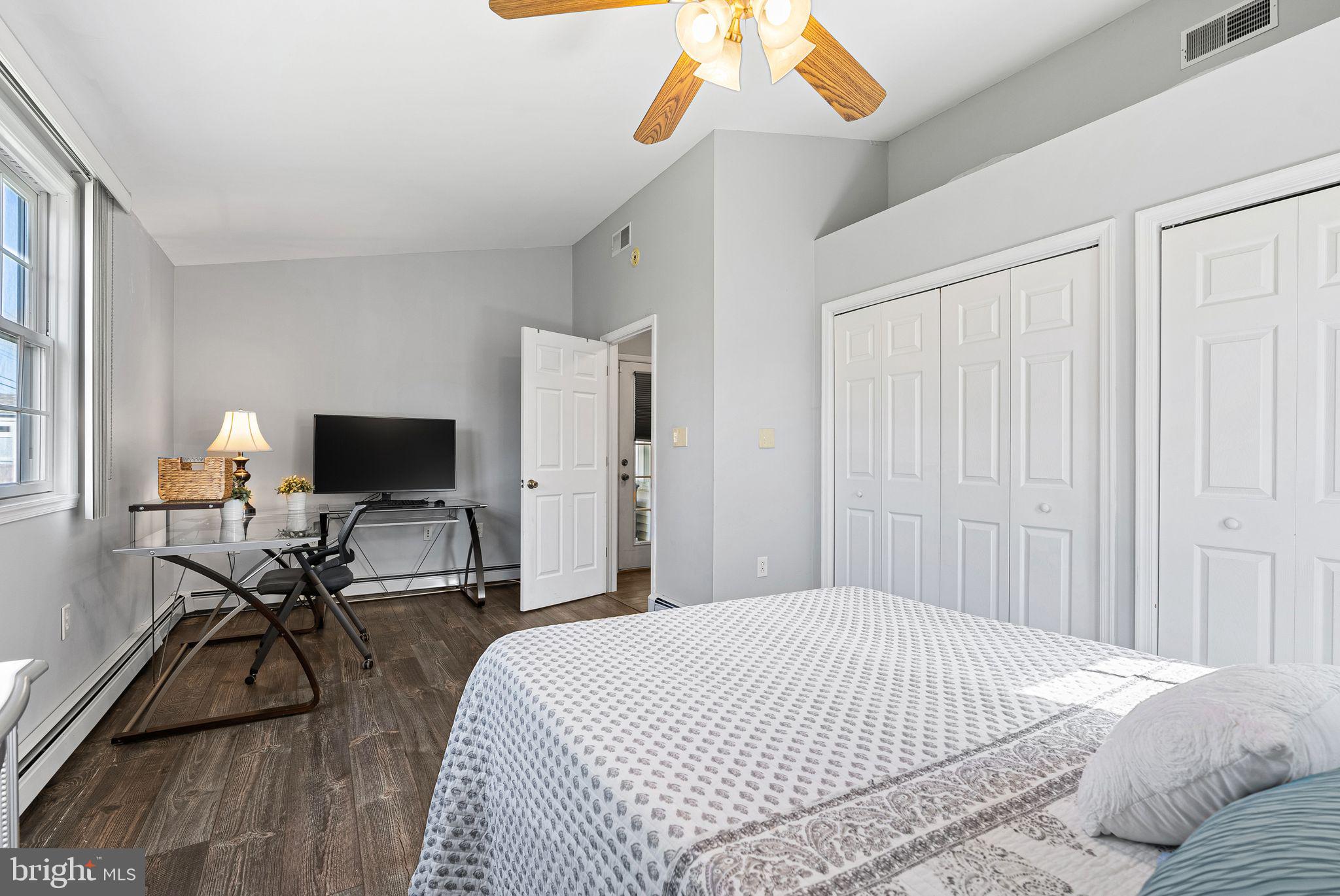 48 Silverbell Road Levittown, PA 19056 - Photo 32 of 35 a bedroom with a bed and a flat screen tv