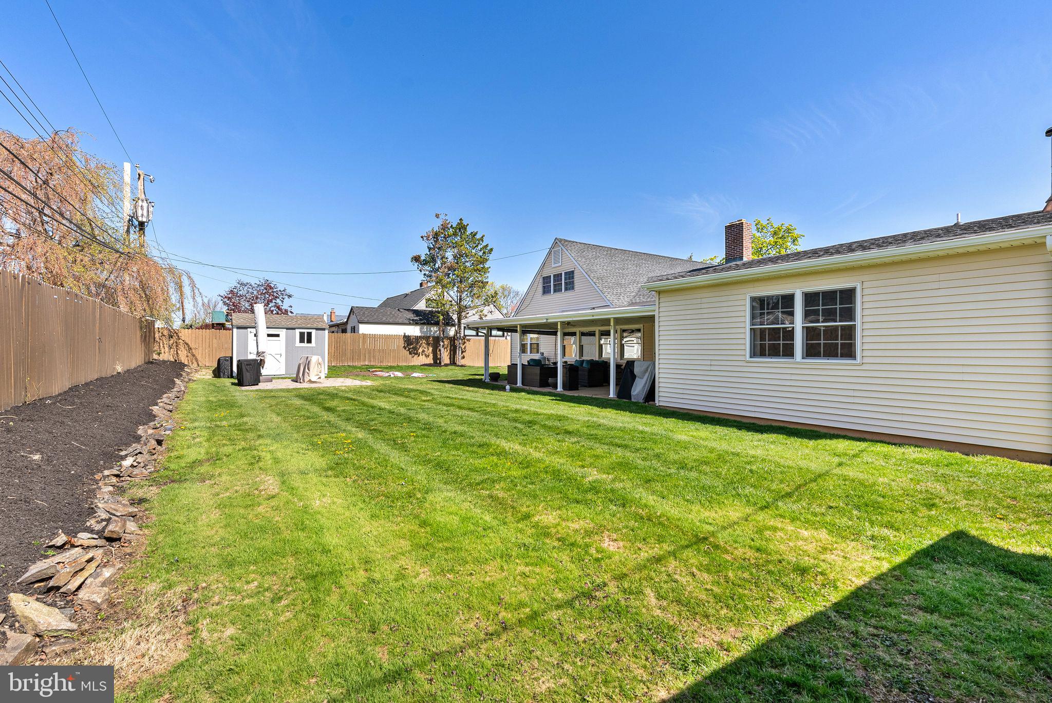 48 Silverbell Road Levittown, PA 19056 - Photo 5 of 35 a front view of a house with a garden