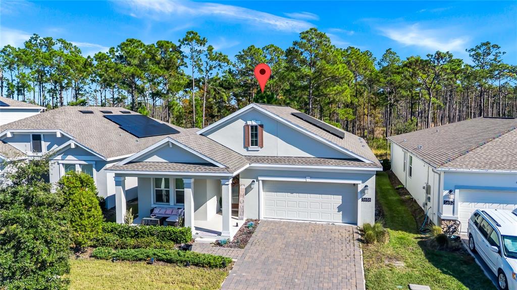 5656 Quiet Palm Loop St. Cloud, FL 34771 - Photo 2 of 36 front view of house with a yard