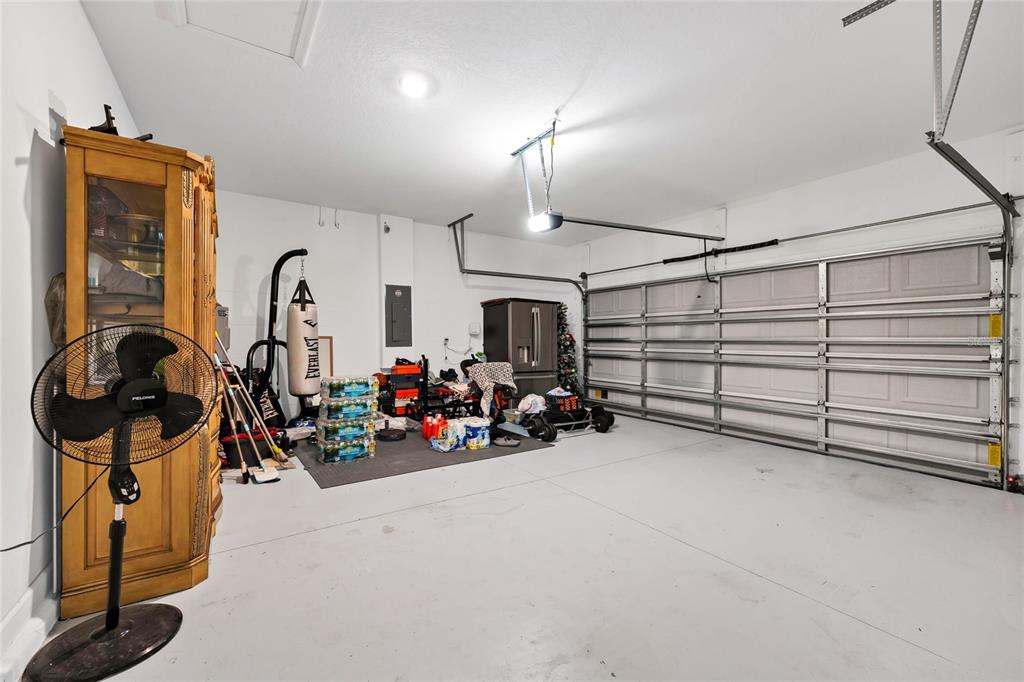 5656 Quiet Palm Loop St. Cloud, FL 34771 - Photo 27 of 36 a view of a room with gym equipment