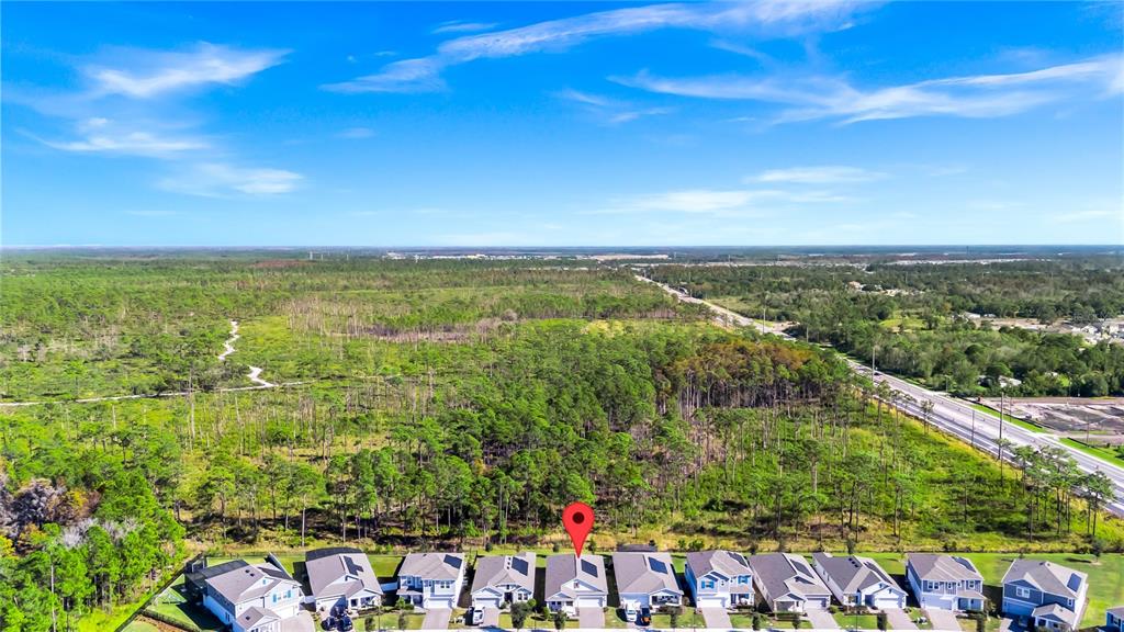 5656 Quiet Palm Loop St. Cloud, FL 34771 - Photo 31 of 36 a view of city and ocean