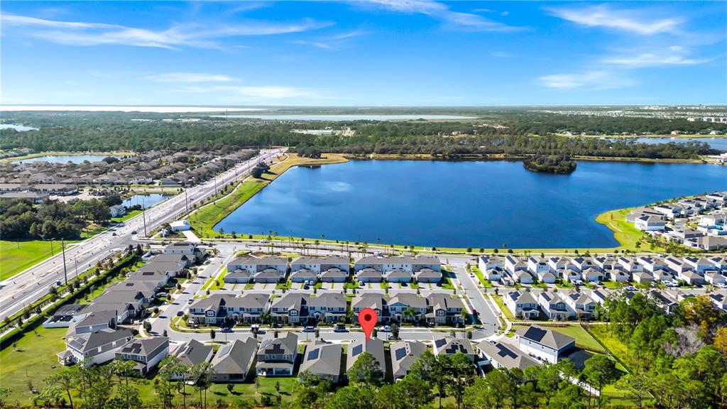 5656 Quiet Palm Loop St. Cloud, FL 34771 - Photo 32 of 36 a view of a city