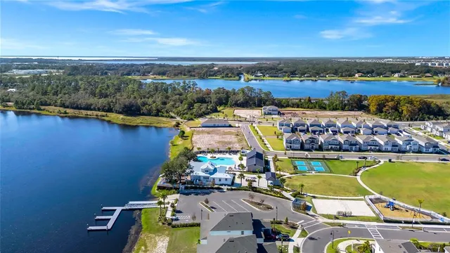 an aerial view of a house with a swimming pool