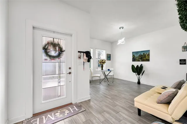 a living room with furniture and a window