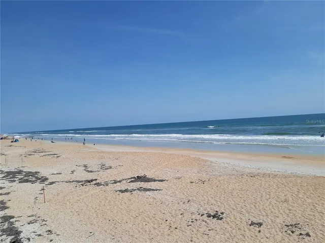 a view of beach and ocean