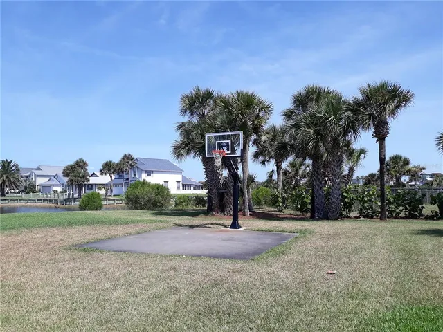 a sign that is sitting in the middle of a field