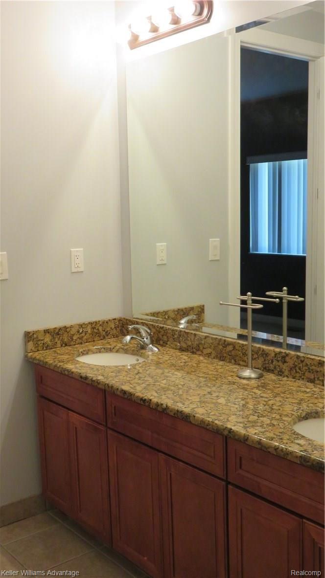 6487 North Beck Road Canton, MI 48187 - Photo 14 of 41 Jack and Jill bath with granite counters
