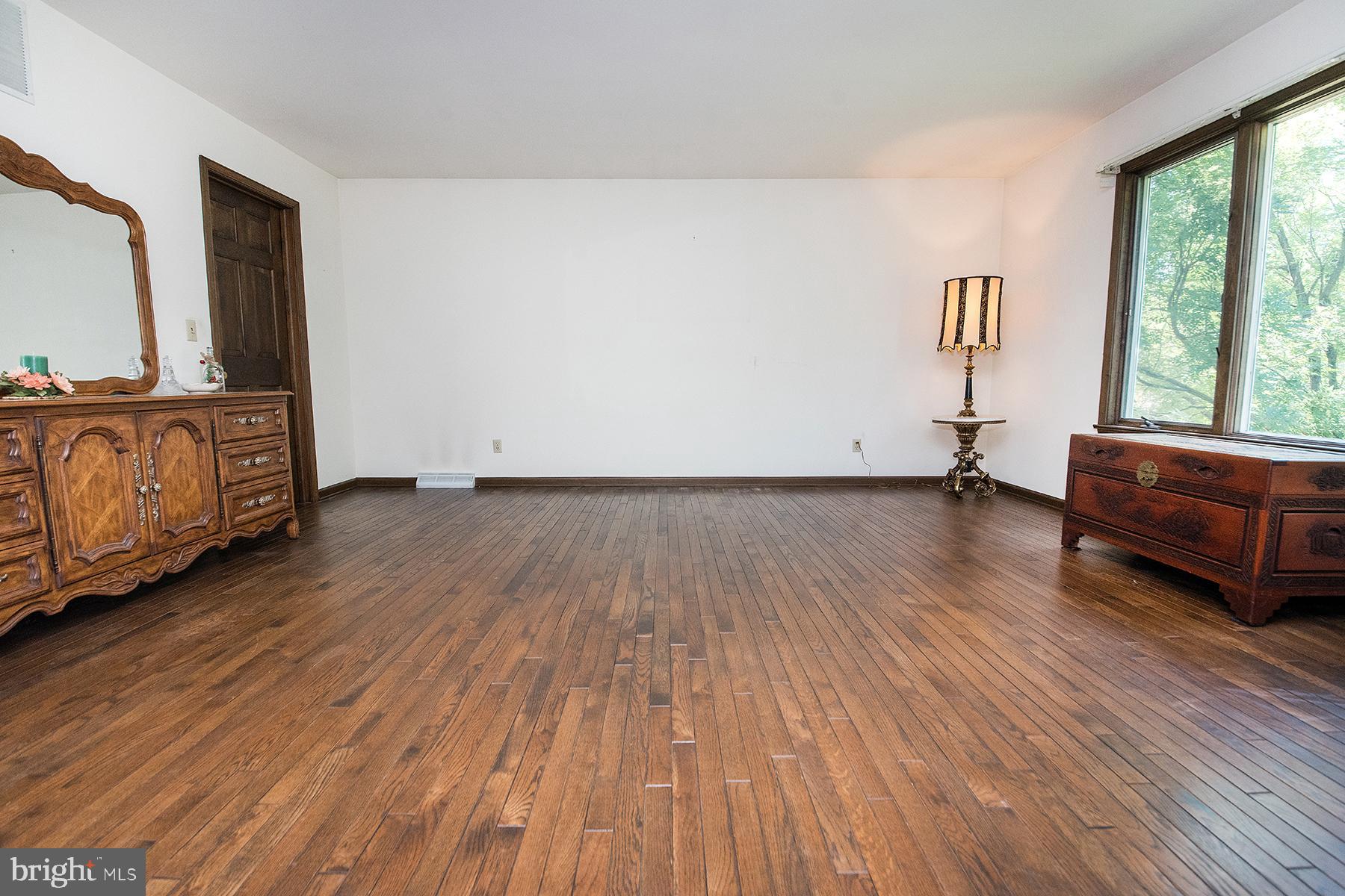 26 Georgetown Road Bordentown, NJ 08505 - Photo 11 of 39 Primary bedroom hardwood floors