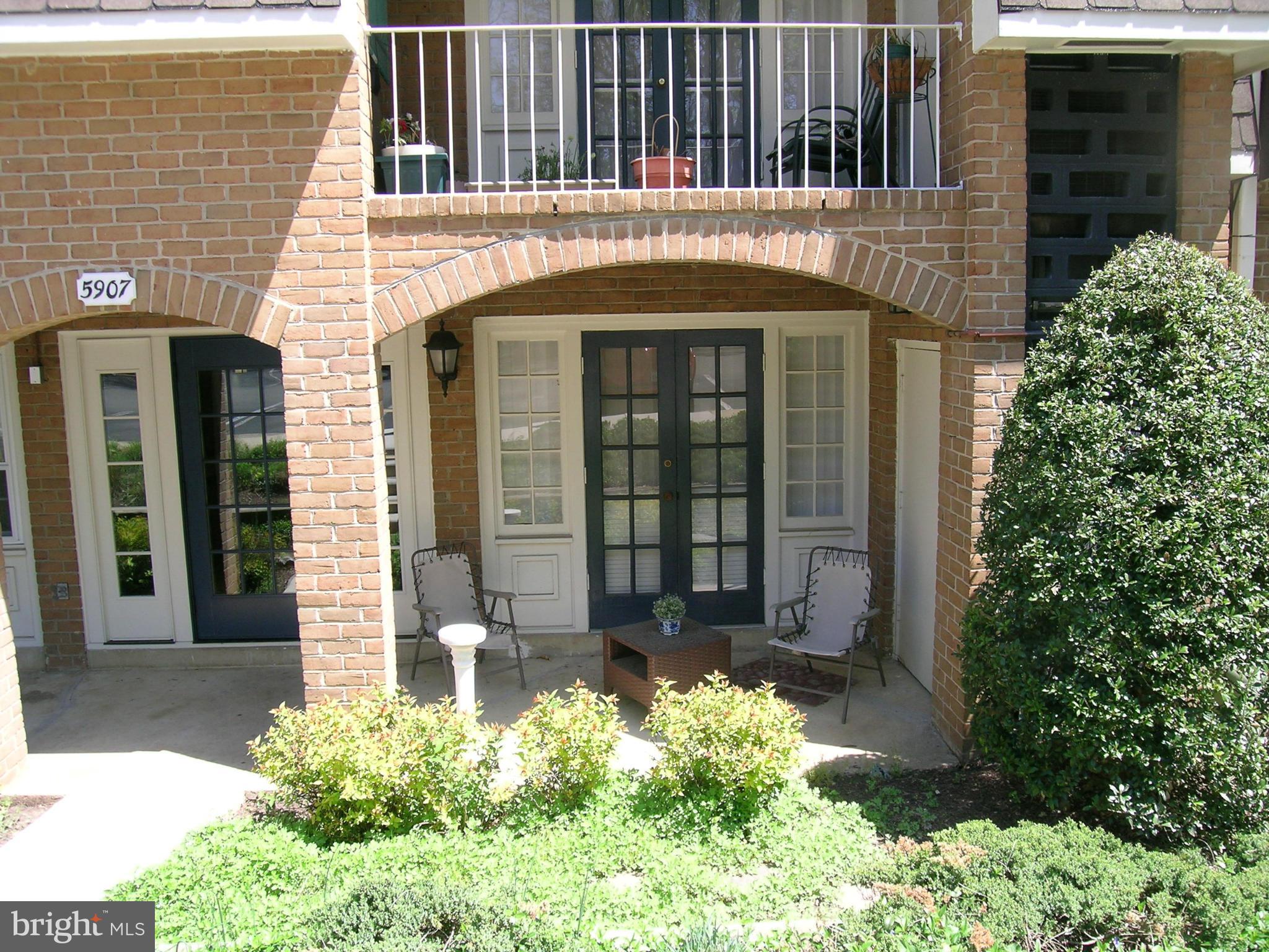 5907 Bayshire Road, Unit 189 Springfield, VA 22152 - Photo 1 of 21 a view of a house with potted plants