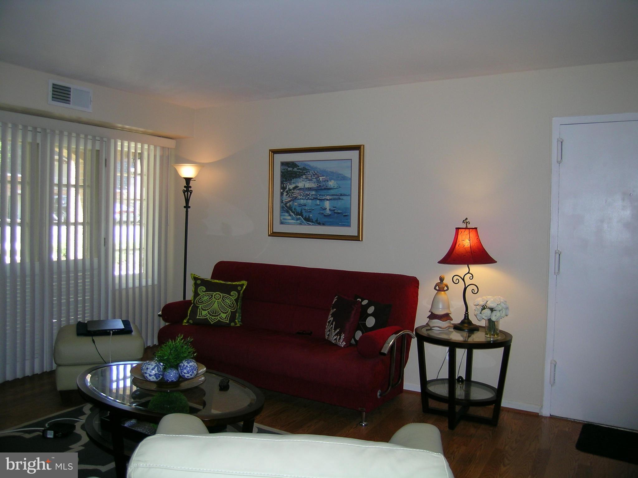 5907 Bayshire Road, Unit 189 Springfield, VA 22152 - Photo 19 of 21 a living room with furniture and a window