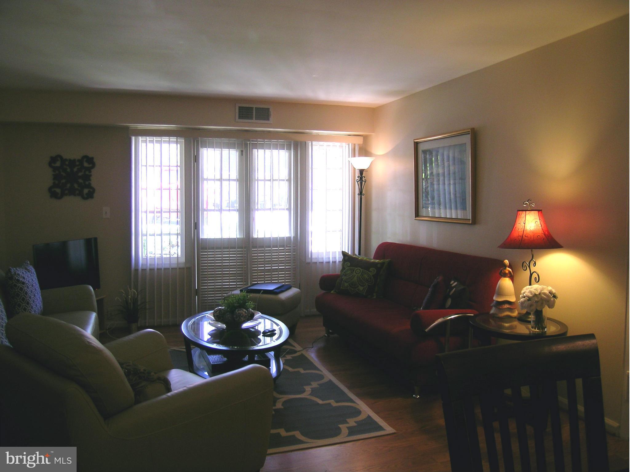 5907 Bayshire Road, Unit 189 Springfield, VA 22152 - Photo 6 of 21 a living room with furniture and a window