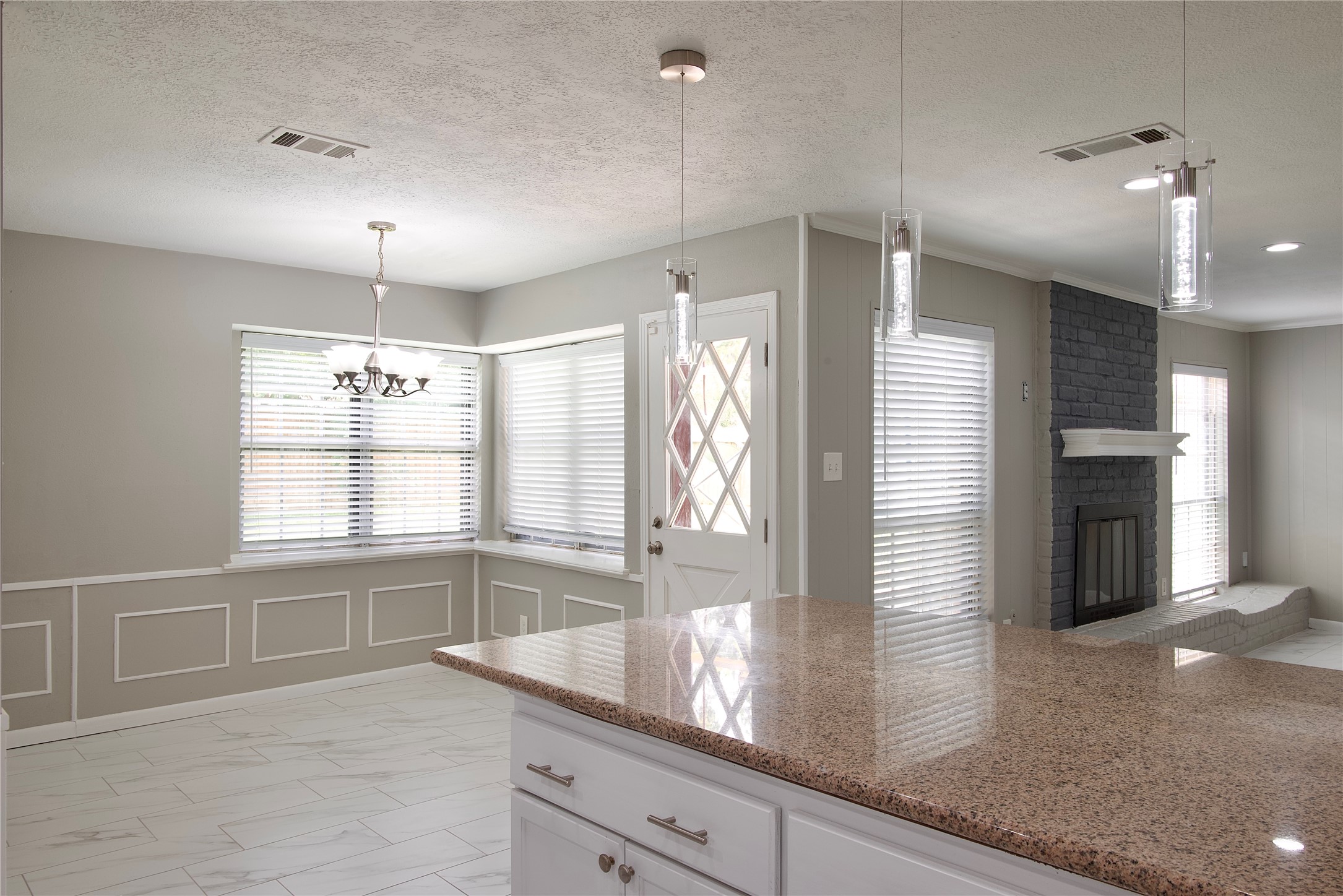 723 Leaflet Lane Spring, TX 77388 - Photo 15 of 41 a kitchen with granite countertop a sink and a large window