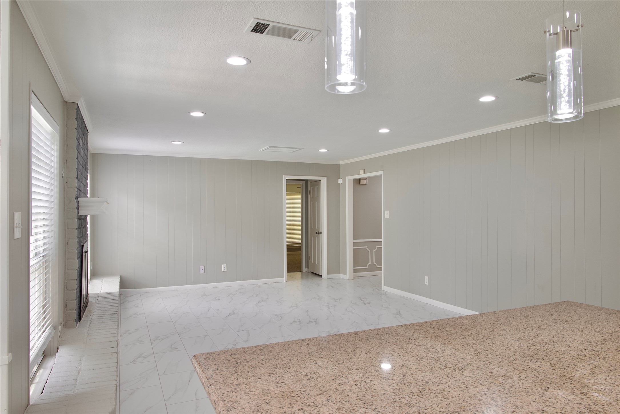 723 Leaflet Lane Spring, TX 77388 - Photo 16 of 41 an empty room with wooden floor and windows