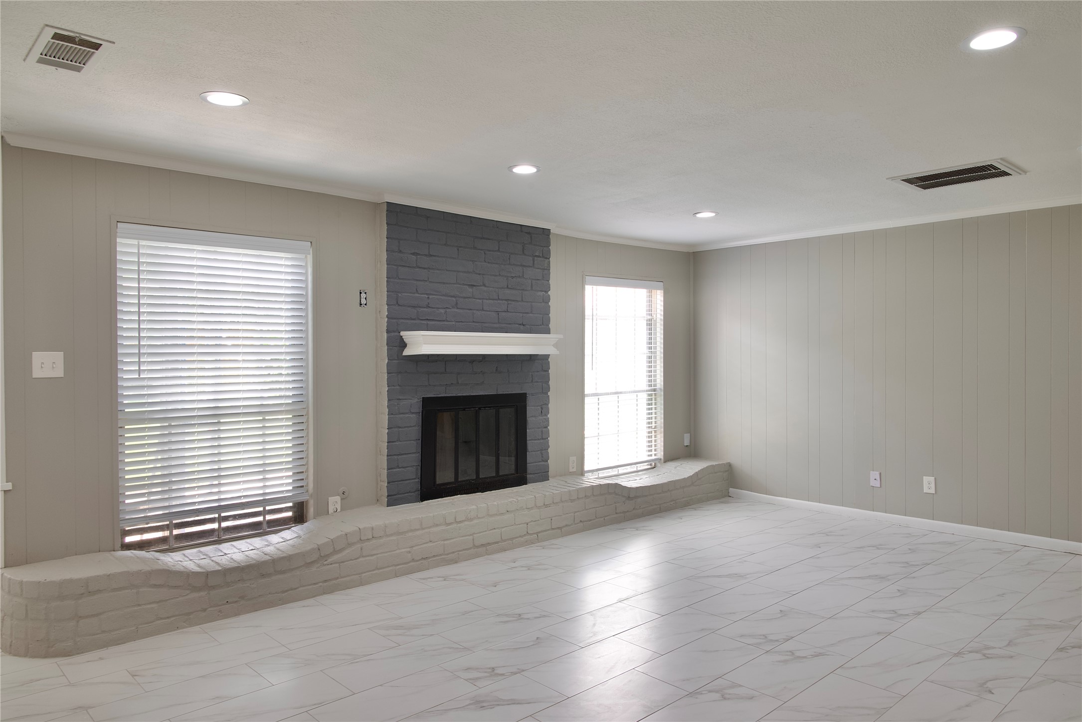 723 Leaflet Lane Spring, TX 77388 - Photo 23 of 41 an empty room with windows and fireplace