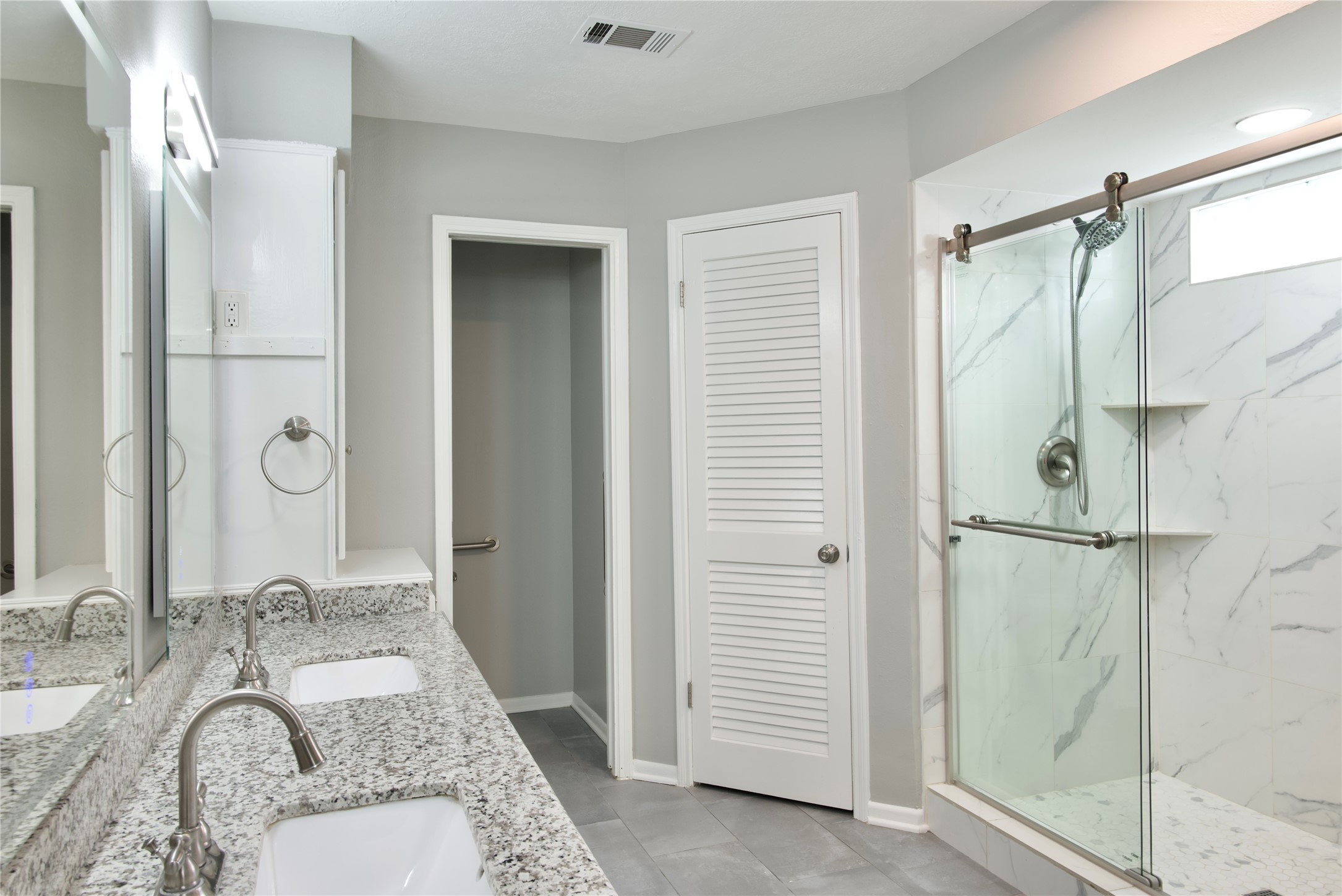 723 Leaflet Lane Spring, TX 77388 - Photo 30 of 41 a bathroom with a granite countertop sink and shower